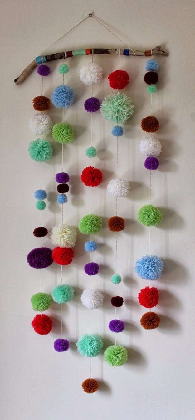 DIY Crafts with Pom Poms - DIY Driftwood Pom Pom Wall Hanging - Fun Yarn Pom Pom Crafts Ideas. Garlands, Rug and Hat Tutorials, Easy Pom Pom Projects for Your Room Decor and Gifts http://diyprojectsforteens.com/diy-crafts-pom-poms